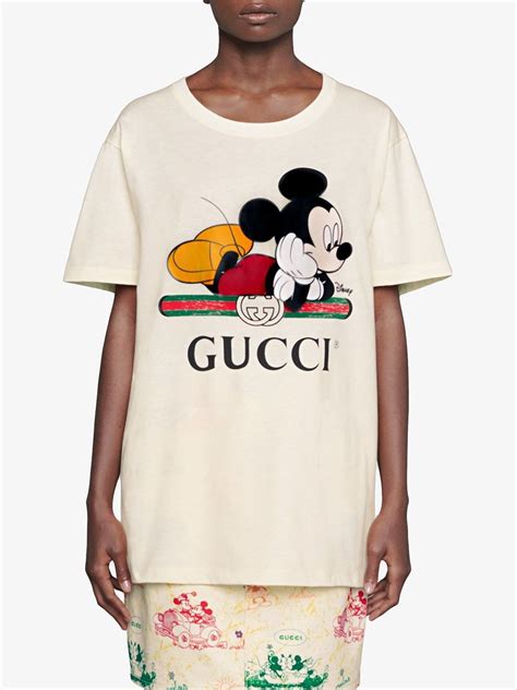 mickey mouse gucci gold grillz|Gucci Mickey Mouse t shirts.